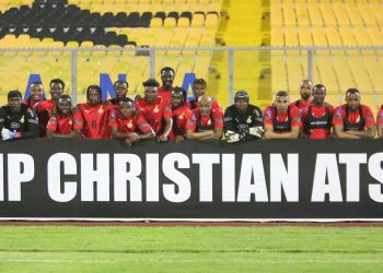 Black Stars players pose with a “RIP Christian Atsu” Banner ahead of Angola qualifier on Thursday